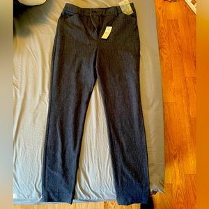 Brand new, never worn Express dark blue skinny high rise stretchy dress jeans.